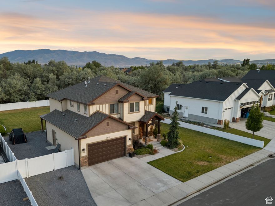 Come check out this incredible home with a backyard that's basically the size of a football field! Located in an ideal Lehi neighborhood, this corner-lot home offers a cozy living room, massive kitchen, and an amazing primary bedroom with a walk-in closet so large that you'll get lost. The extra-long, 2-car garage is great for your larger vehicle, and you also have ample space on the side of your home for your boat, RV, and/or trailer. Lastly, enjoy the walking trail behind your property that offers stunning views and small natural ponds. Come tour this home before it's too late!