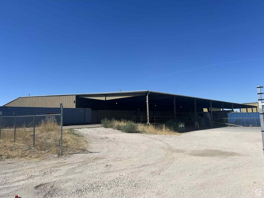 Industrial warehouse for lease. This 16,736 SF open warehouse features 3-phase power and a small receiving office, with high ceilings that optimize storage and workflow. A covered truck dock includes two 10' high x 8' wide overhead doors and one 10' high x 10' wide overhead door for versatile loading and unloading. The property also offers a 20,316 SF secure fenced storage yard and a 5,100 SF total cement dock area with a ramp to streamline dock operations. Zoned Ogden City M-2 for maximum flexibility and compatible uses. Ogden City HUBZone certified, enhancing business incentives. This space is ideal for warehousing, distribution, or light manufacturing with easy access to freeway, transportation routes, and urban infrastructure.