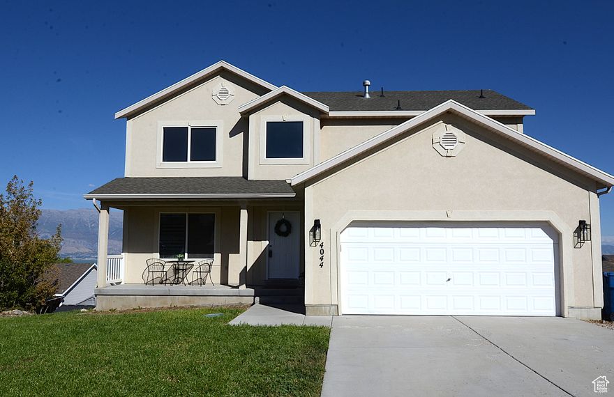 SELLER TO PAY UP TO $10,000 IN CLOSING COSTS!! Stunning lake and mountain views from all 3 levels of this freshly remodeled Saratoga Springs home.  Two decks on the main and basement level to enjoy the panoramic views of the lake and mountains.  New carpet in all 4 bedrooms of the 2nd floor and Luxury Vinyl Plank in 2nd floor landing, stairs and throughout the main floor.  New paint throughout, freshly paint on the 2 decks, new lighting and blinds.  Bring your 4 wheeler's, side by sides and enjoy off road access mere feet from your property along with fishing just blocks away.  This home has access to all the best Utah has to offer, bring your outdoor enthusiasts!