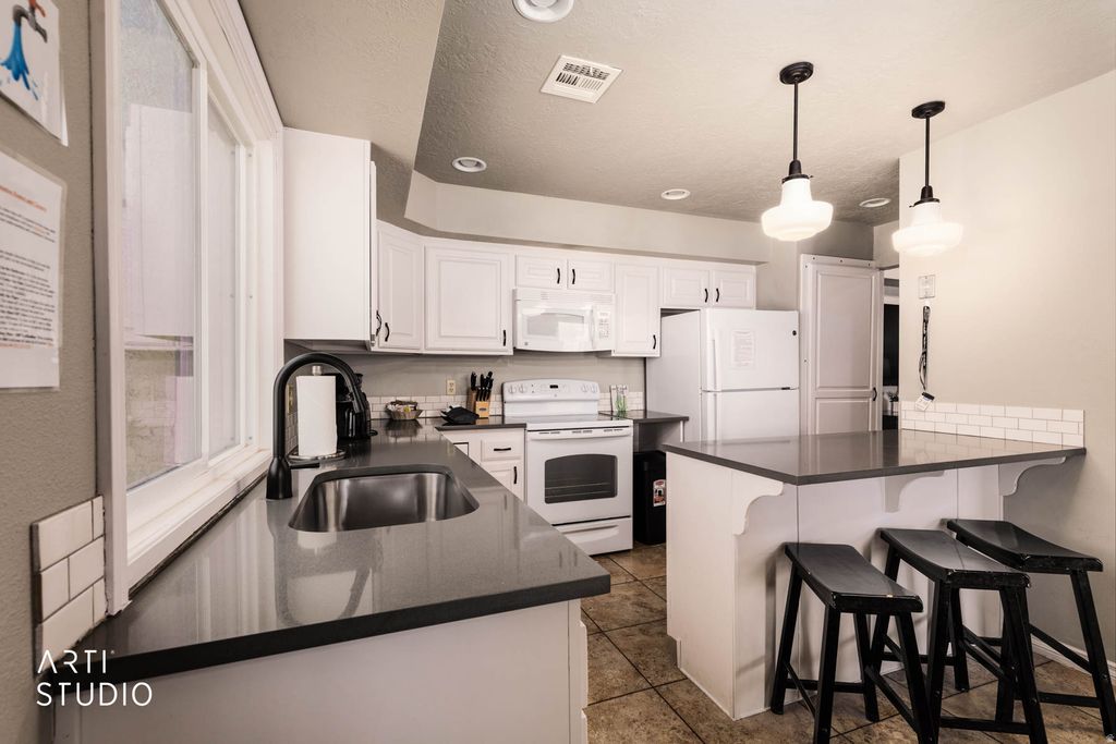 Photo of 860 S VILLAGE RD W #I10, Saint George, UT 84770 (MLS # 2133218)