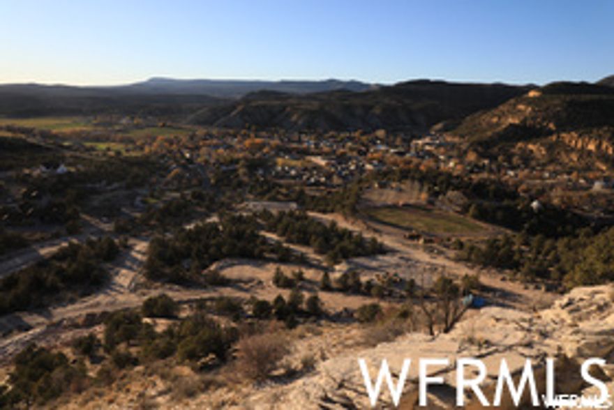 Incredible Lot! Red Valley Heights Phase 1 with 1.68 acres overlooking highway 89, and Orderville valley with magnificent white cliffs as a backdrop. Sitting at the base of Red Hollow Slot Canyon trail. Enjoy the old original Main Street US-89, rich Utah history, best temperatures in the state, small town living at its finest with utilities brought to the front of each lot. 18 acres open space behind the lot. CC&R's but no HOA, best of all worlds. Red Valley Heights is just minutes away from Zion National Park, Bryce Canyon, Kanab, and 1 hr and a half from Lake Powell. These lots are going fast! Square footage figures are provided as a courtesy estimate only and were obtained from surveyor report.  Buyer is advised to obtain an independent measurement. Square footage figures are provided as a courtesy estimate only and were obtained from Kane County.  Buyer is advised to obtain an independent measurement.