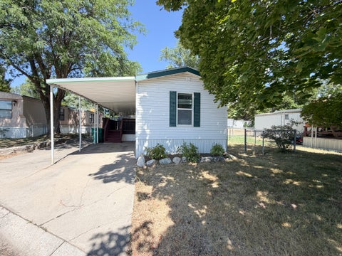 Photo of 1200 CHURCH ST #17, Layton, UT 84040 (MLS # 2179977)