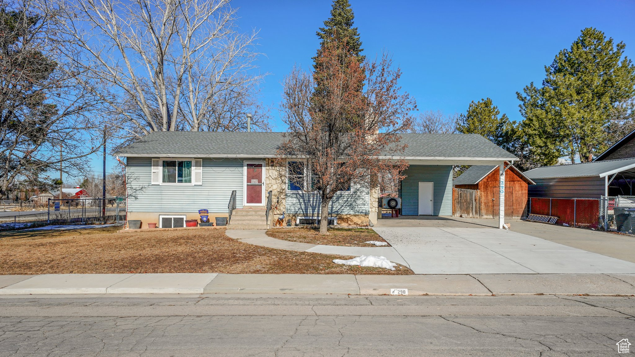 Quaint rambler with sweet small town living near the east bench of the mountains and minutes from I-15. This home features 2 ample sized bedrooms on the main floor and 2 additional large bedrooms in the finished basement. Enjoy winter nights in front of the wood burning fireplace on the main floor or the pot-belly stove in the basement. This nice corner lot is across the street from the local Cole Park. The roof is less than a year old as well as the upper floor windows. The kitchen has a new range/oven and kitchen faucet. The main floor carpet is also new. This home is waiting for your special touch to make it your home. Sq ft figures provided as a courtesy estimate only and were obtained from an appraisal.  Buyer is advised to obtain an independent measurement.