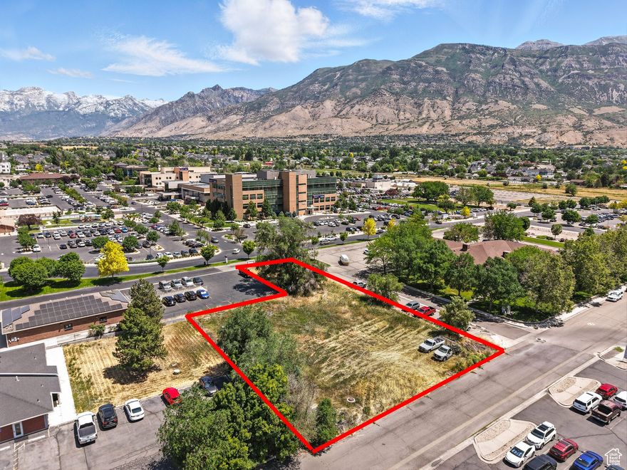 Your plans or ours. Very versatile American Fork commercial lot.   We have it plat approved for a planned MEDICAL PROFESSIONAL OFFICE SPACE. Fully engineered plans available with lot purchase  PROPERTY OVERVIEW 0.61 acre parcel immediately south of the American Fork Hospital Approved plans: Building Type: Class-A Medical / Professional Office Total Area: 8179 sq ft Stories: 2 Suites: 6 suites across 2 floors Occupancy Type: Group B (Business) Construction Type: Type VB (Fully Fire Compliant) 34 parking bays    BUILT FOR MEDICAL EXCELLENCE Purpose-built for healthcare and professional use Non-sprinklered, Type VB per 2021 IBC ADA-compliant with elevator, stairwells, accessible restrooms Generous natural light and modern finishess SUITE HIGHLIGHTS Main Level: 4,090 SF Ideal for urgent care, general practice, or dental Upper Level: 4089 SF Perfect for medical specialists, therapy, administration, high-tech office Divisible floor plans  configure to suit your practice needs  LOCATION ADVANTAGES Prime spot off State Street near AF Hospital, Orthetime Orthodontics, and other healthcare clusters Directly across from major retail and residential developments High-visibility frontage with ample on-site parking  BUILDING FEATURES Floor-to-ceiling windows in lobby & suites Suite Numbering: 101-104 (Main), 201-203 (Upper) Architectural exterior: stone, wood, metal paneling Shared lobby with branding opportunities