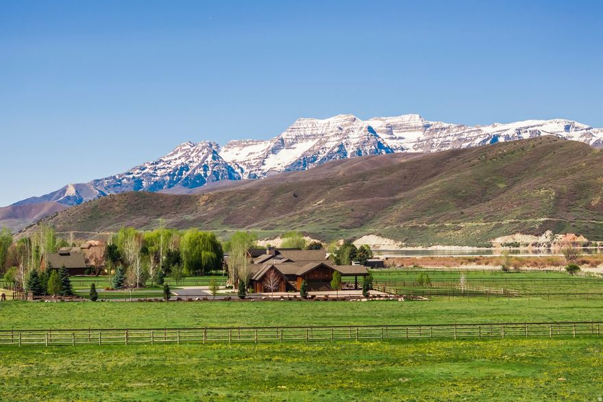 Opportunities like this are incredibly rare-one of the few properties in Wasatch County that backs directly to the Provo River, offering a unique combination of privacy, natural beauty, and year-round recreation. Set on 6.2 fully fenced acres in prestigious Winterton Farms, this quiet cul-de-sac setting provides the perfect backdrop to build your dream home. Enjoy the sights and sounds of the river just beyond your backyard, creating a peaceful retreat that's hard to find and even harder to replicate. Take in sweeping views of Soldier Hollow, a world-renowned Nordic venue that hosted cross-country skiing and biathlon events during the 2002 Winter Olympics and is set to play a key role in the upcoming Winter Olympics in Utah. The area continues to draw athletes and outdoor enthusiasts from around the globe, offering pristine trails and a rich Olympic legacy. The property also captures incredible, unobstructed views of the Wasatch Back, including the iconic Mt. Timpanogos-delivering stunning sunrises, glowing sunsets, and ever-changing mountain scenery in every direction. All of this, while being just minutes from the amenities of Park City, Midway, and Heber, with easy access to world-class skiing, blue-ribbon fishing, championship golf, ATV and hiking trails, and a growing selection of local restaurants and shops.