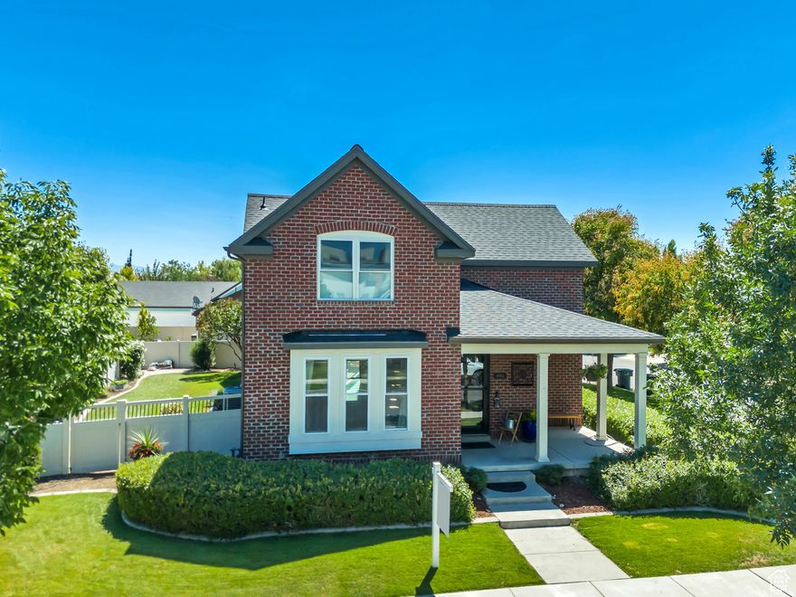 This stunning all-brick home with separate STUDIO APARTMENT/ADU (accessory dwelling unit) offers the perfect blend of classic craftsmanship and modern upgrades. With 4 beds, 3.5 baths there is room for everyone. Primary bed on the main, with attached laundry.*ALL APPLIANCES ARE INCLUDED IN SALE*. 3 washers 3 Dryers and 2 Refrigerators. Updated and remodeled gourmet kitchen with granite counters, SS appliances. The studio ADU features new flooring and paint, perfect for guests, rental income, or a private home office. The ADU adds 541 square feet (not included in the SF of the home) with a full kitchen, bathroom, family room and a space for a bed. Beautifully manicured yard with a fully fenced large flat area for entertaining with a new deck. This home has so much to offer. Please see the full list of upgrades on "listing documents". ***GREAT LOCATION*** Daybreak Amenities include; over 50 miles of walking trails, 5 pools, tennis courts, pickle ball courts, on-site workout facility, parks, schools, and trails all within 5 minutes walking distance. Outdoor basketball and sand volleyball as well as, community garden plots. Enjoy taking out a paddle-board or a canoe during the summer! Not to mention the famous Daybreak Summer Concert Series, Pumpkin Regatta, and the NEW BEES BASEBALL STADIUM IN THE FALL! Daybreak has a place for every style of living. Square footage figures are provided as a courtesy estimate only and were obtained from county records. Buyer is advised to obtain an independent measurement