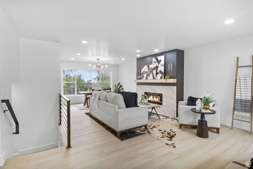 *PRICE IMPROVEMENT!!!*** This beautifully updated property offers bright, open living spaces with hard floors, and large windows that bring in natural light.  Newly landscaped front yard. Enjoy a cozy fireplace, luxury touches and a spacious backyard perfect for entertaining.  Just minutes from Sugarhouse Park, local dining, shopping. This home combines comfort, convenience, and views in one of Salt Lake's most desirable neighborhoods. Home owners are HIGHLY motivated!