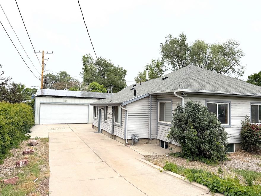 Basement Apartment with it's own entrance. House has 2 kitchens & 2 Laundries. Large Master Bedroom with double closets. Big Covered Front Porch. Fridge, Freezer & Washer/Dryer are included. Has a Hot Tub in the Large Covered Patio. HUGE pergola & Fenced Yard and Driveway. Oversized Kitchen Pantry, S.S. Appliances & Real Hood Vent. Brand New Water Heater. There is a oversized garage door that is 8 ft tall. Garage is extra deep & 4 car wide. Has it's own heater & thermostat. Has a office in half of it with work benches & 220 power.  There is an ADU already built in the back. Has sewer line stubbed. Has it's own power meter already ran. Breaker panel & electrical have already been started in it. It comes with the Mini Split AC Unit. Has Paid off Solar Panels. Sq ft is approx & buyer to verify.