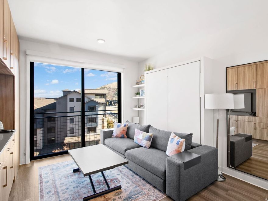 Top-floor residence at Canyon Haus (formerly YotelPad Park City), offering a highly functional layout with sleeping for four and excellent built-in storage. The building features outstanding amenities including private workspaces, game/arcade room, fitness center, sauna, lounge, coffee center, hot tubs, pool, underground heated parking, and dedicated owner storage. Ideally located just steps from restaurants, the Sunrise and Red Pine Gondolas, and the Orange Bubble Express chairlift. This property is well suited as a vacation getaway or short-term rental investment and represents one of the most affordable resort property opportunities in Park City.