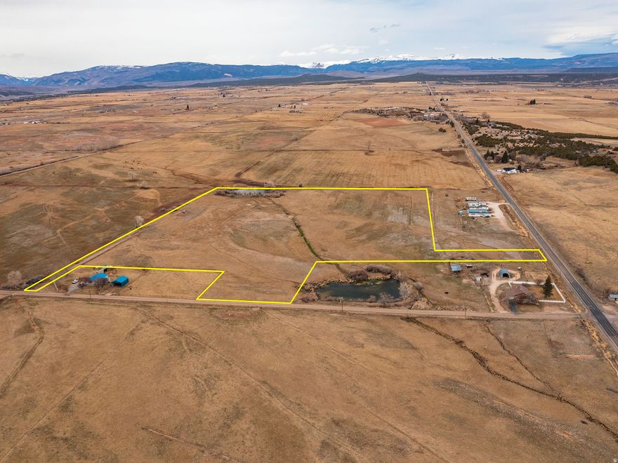 Beautiful acreage with stunning mountain views! This fully fenced property includes 26 shares of BIA irrigation water (buyer to verify water shares) and is currently used as pasture for horses. With access from both the south and east sides of the lot, it offers flexibility for future use and the potential to build your dream home while enjoying wide open space for whatever you desire.