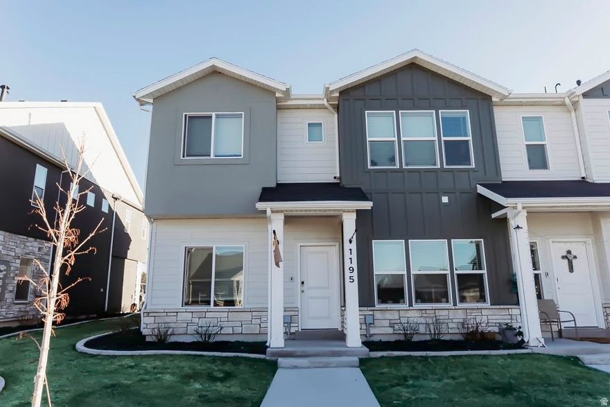 Welcome to this like new, end unit townhome in one of Cache Valley's most desirable neighborhoods! Built just 2 years ago, this adorable home offers incredible curb appeal, breathtaking views & a bright, open layout filled with natural light from oversized windows & soaring ceilings. The stunning kitchen is a true centerpiece, featuring quartz countertops, stainless steel appliances & modern finishes, perfect for both everyday living and entertaining. Enjoy the convenience of smart home features throughout, including a Ring doorbell, keypad front entry, smart thermostat & wireless garage door opener. The spacious primary suite boasts a large walk-in closet and double vanity, while the second bedroom offers its own en-suite bathroom & walk-in closet, ideal for guests or added privacy. The oversized one-car garage provides extra storage space, plus additional parking in the driveway. Step outside and enjoy a community park & playground just steps away, perfect for relaxation and recreation. Ideally located in Logan, in the heart of Cache Valley, you'll love being close to Utah State University, Logan Canyon, Bear Lake, hiking & biking trails, parks, shopping, restaurants & year-round outdoor recreation including skiing, fishing, and boating. This one checks all the boxes, schedule your private showing today!