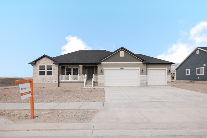 Welcome to Rose Ranch-an exciting new community in the heart of Eagle Mountain! These thoughtfully designed single-family homes shine with larger lots, giving you space for a three-car garage and plenty of outdoor living. Rose Ranch offers a vibrant, community-focused lifestyle with pickleball courts, the Eagle Mountain Ranch Bike Park, nearby schools, and easy access to local favorites like The Ranches Golf Club, Utah Lake, scenic parks, and trails. Surrounded by stunning mountain views, it's the perfect place to call home. Contact us today to start planning your future in Rose Ranch! (EMILY LOT 122)