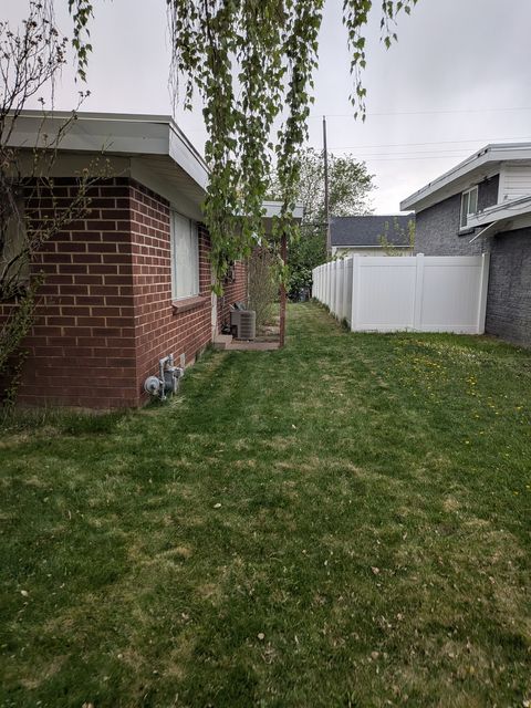 Photo of 785 S SIMORON DR E, Ogden, UT 84404 (MLS # 2152908)