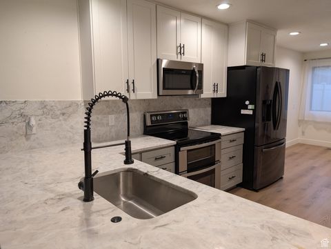 Tiny photo for 1575 E 6430 S, Salt Lake City, UT 84121 (MLS # 2106394)