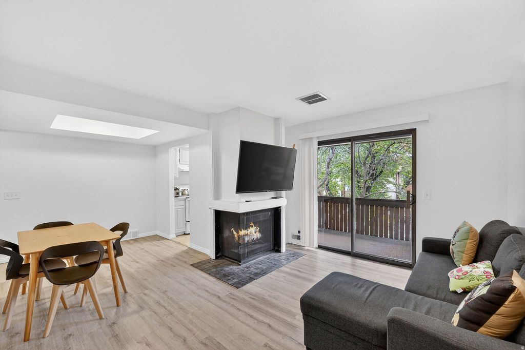 Photo of 6869 S COUNTRYWOOD CIR #8D, Midvale, UT 84047 (MLS # 2147978)