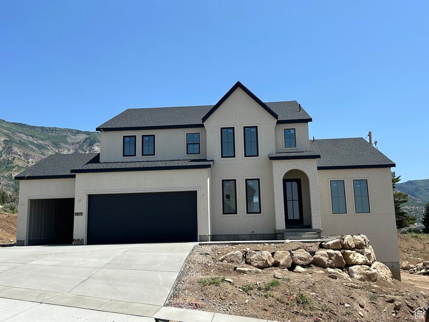 This home has it all - custom kitchen cabinets, a tankless water heater, an additional furnace for the second story, a study on the main floor, and a three-car garage - all situated on a spacious lot. Views of Ben Lomond Peak along with the valley below, with close proximity to downtown Ogden, Pineview Reservoir and Snowbasin. Photos are of the same floor plan of a different home, in the same neighborhood. Square footage figures are provided as a courtesy estimate only and were obtained from builder plan set. Buyer is advised to obtain an independent measurement.