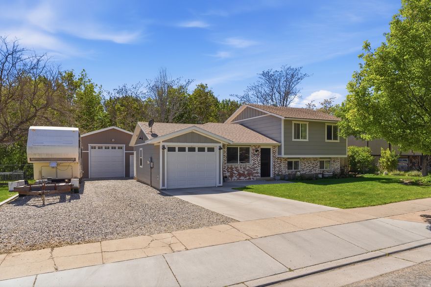 House completely redone w/ massive addition added in 2020. Rare find w/ large shop, RV parking & newer roof. Completely custom remodeled inside & out w/ beautiful finishing touches all throughout. Spacious open kitchen & large family rooms. Large primary bedroom w/ walk-in closet & gorgeous primary bathroom w/ separate tub/shower. Large detached 20x26 sq ft garage w/ 12 ft ceilings. Adorable large playhouse in the fully fenced backyard. Located next to large park w/ walking trails & pickleball courts. Tons of trees for yard privacy. Don't miss out on this one!!