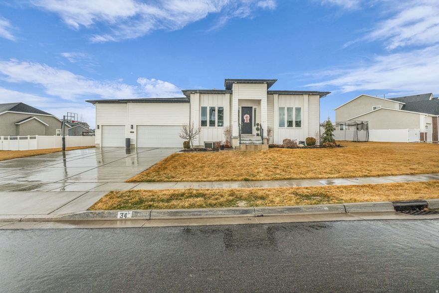 **OPEN HOUSE 2/21 11:00-1:00** Welcome to this inviting Kaysville home offering space, comfort, and unbeatable location! Situated in a quiet, established neighborhood, this property features a functional layout with soaring ceilings and gorgeous floor to ceiling windows that fills the space with natural light and plenty of room to gather, relax, and entertain. The kitchen flows seamlessly into the main living space, creating the perfect setting for everyday living. When you don't want the sunshine coming through your windows use your automatic shades that you can control from your phone or set them up on a timer on when you want them down. This home has plenty of storage space not only in the basement but plenty in your garage!! Step outside to a spacious yard with room to play, garden, or host summer get-togethers. Conveniently located just minutes from the W. Davis Corridor, I-15, and Farmington Station for shopping, dining, and more. This home has it all-don't miss your chance to see it!
