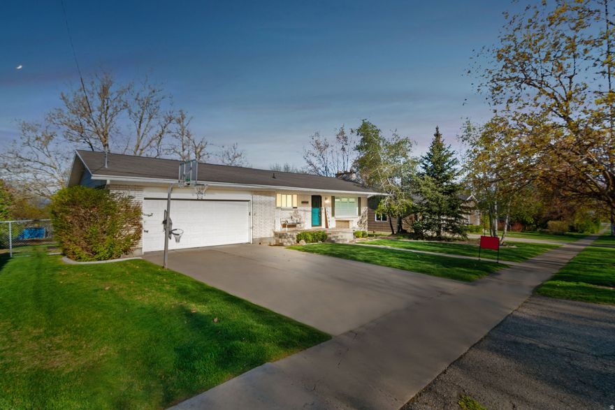 Remodeled Elegance with Dream Shop, and RV Parking  Step inside to a beautifully remodeled main kitchen that serves as the heart of the home. It features gorgeous custom cabinetry, elegant granite countertops, and a classic subway tile backsplash. The main-floor master suite is a true retreat, complete with its own private door leading out to a secluded deck-perfect for unwinding at the end of the day.  Need space for guests, entertaining, or multi-generational living? The lower level boasts a second full kitchen in the basement, offering incredible flexibility and convenience.  But the true crown jewel of this property is the exterior amenities. Get ready to fall in love with the massive 30x50 detached shop. Heated by a cozy wood-burning stove, it's an ideal year-round workspace for any project. Plus, you'll never have to worry about protecting your toys from the elements with the huge 20x30 covered RV parking area.