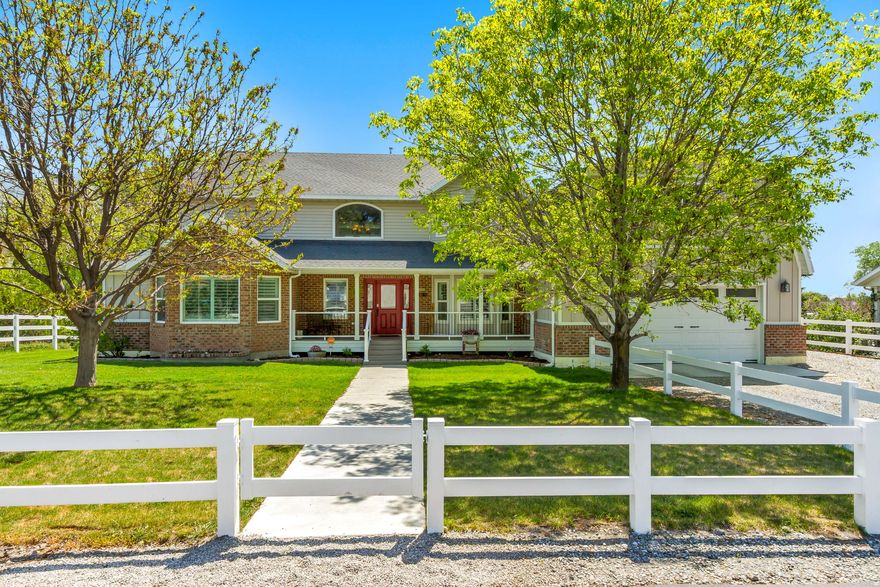 Tucked away on a private lane in one of the last remaining pockets of American Fork where properties like this still exist, this fully finished estate offers an increasingly rare combination of usable acreage, privacy, mountain views, and flexibility all within minutes of modern convenience. The setting feels more like a countryside retreat than a typical neighborhood property, surrounded by open space, mature landscaping, and panoramic views stretching across Mount Timpanogos, Box Elder Peak, and Fox Hollow Golf Course. Opportunities to own this kind of land, privacy, and lifestyle in American Fork have become exceptionally limited, making this a truly unique offering in today's market. The home has been well maintained and thoughtfully updated within the last five years, blending timeless charm with modern comfort. Inside, the home offers a warm and inviting feel with plenty of opportunity for a buyer to further personalize or expand over time. The grounds are what truly make this property special, featuring mature apple and peach trees, blackberry and raspberry bushes, open pasture space, and a barn with additional back acreage ideal for horses, cattle, goats, hobby farming, or recreational use. The backyard was designed to be enjoyed with a built-in fireplace, spa, and elevated deck perfectly positioned to take in the surrounding mountain and valley views. Properties with this much usable land, privacy, and flexibility in the heart of American Fork are becoming exceptionally difficult to find. Buyer/Buyer's Agent to verify all information.