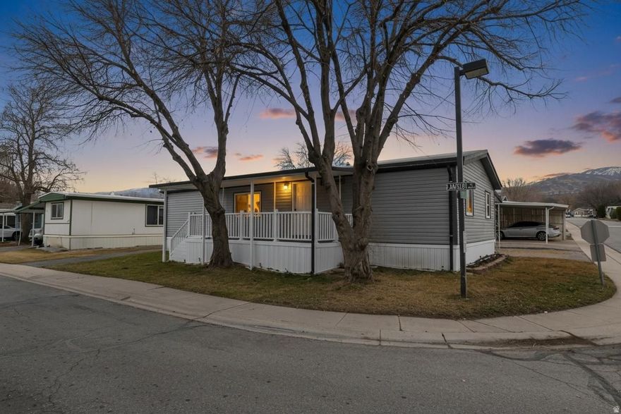 Updated 3bed, 2bath home in the Camelot community with refreshed kitchen cabinets, updated countertops, new LVP flooring, new carpet, fresh paint, and updated lighting and fixtures. Bathrooms have modern touches, exterior skirting and siding have been refreshed, and the HVAC system is brand new. Bright open layout with great natural light. Buyer must be approved by community management.