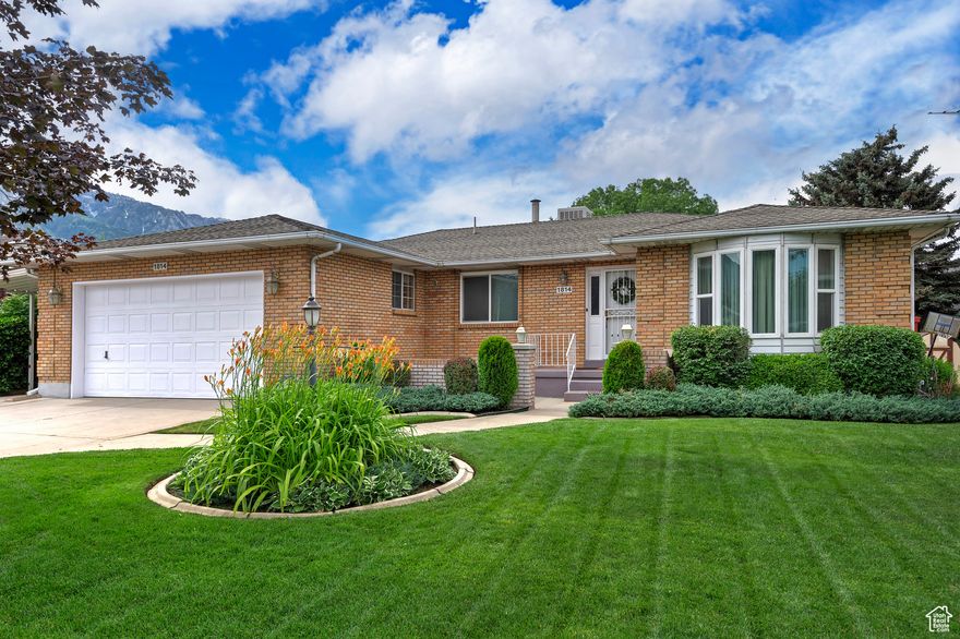 Charming and meticulously maintained all-brick rambler is situated on a spacious lot in the desirable High East Sandy neighborhood. The home offers nearly 3,500 square feet of living space, featuring six bedrooms and three bathrooms, making it perfect for families or those needing extra room. It includes a two-car garage, a carport, and RV parking for added convenience. Inside, you'll find a second kitchen downstairs, ideal for entertaining or multi-generational living. The house is equipped with energy-efficient furnaces and a 50-gallon water heater to help keep utility costs down. Comfort is enhanced by an evaporative roof cooler with ducting to each room, operated via a thermostat for personalized climate control. Recent upgrades include 40-year shingles, providing peace of mind and added durability. Located just minutes from world-class golf resorts, shopping, restaurants, and entertainment, this home combines prime location with comfort and practicality. It's an exceptional property that offers both convenience and a welcoming atmosphere.