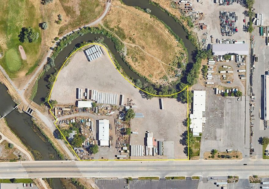 6.64 acres of prime real estate located near freeway access and numerous amenities. Flexible Zoning permits high density multifamily, town home development or industrial outside storage (current use). Site has +/- 10,000 sf of shop space. Current tenants are short term  Seller has a 161 unit (could achieve 200) townhome project submitted to the city for approval.   Land pricing ($41.00/SF) is far below comparable sales in the MU11 zoning ($80-110/sf) Members of the ownership entity are licensed real estate agents in the state of Utah.