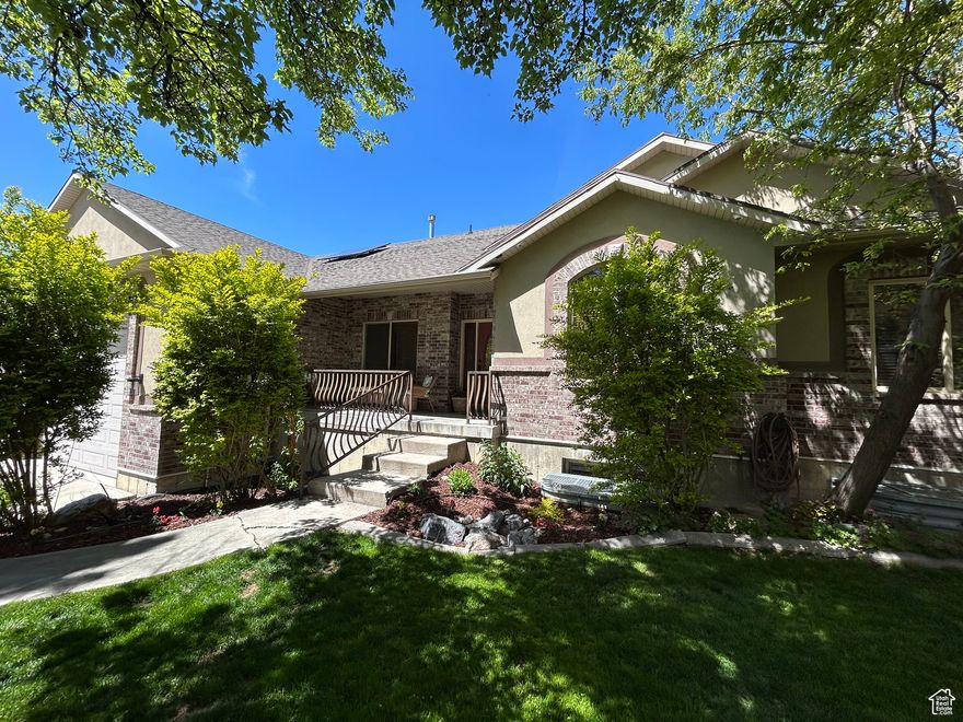 This must-see home is nestled in a beautiful, secluded setting with stunning views of the mountains and lake. Ideal for those who appreciate both luxury and tranquility.  This open floorplan is perfect for entertaining and creates an inviting atmosphere for gatherings with family and friends. The amazing basement family room is equipped with surround sound and a wet bar, making it the perfect space for hosting movie nights, watching the big game, or simply relaxing in style. This house has a walk-out basement leading to a spacious patio, and a large covered deck with breathtaking sunset views. Whether you're enjoying quiet evenings outdoors or hosting a lively get-together, the outdoor space is simply spectacular. The heated garage, conveniently located just off the mudroom, provides plenty of room for storage or tackling projects. Nothing is impossible in this well-equipped space. With the long driveway, ample parking, and RV cleanout, there is plenty of room for guests and all your toys. Set in a secure gated community, this home offers privacy, luxury, and functionality all in one place. Don't miss the chance to experience this exceptional property firsthand!    Square footage figures are provided as a courtesy estimate only and were obtained from County Records and Builder plans.  Buyer is advised to obtain an independent measurement.