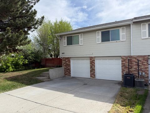 Photo of 4497 S EDGEWARE LN W, Taylorsville, UT 84129 (MLS # 2150100)