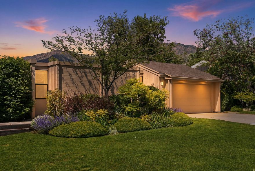Showings begin Monday June 1st.  Designed by renowned Utah modernist architect Ron Molen, this architecturally significant residence is a rare opportunity to own an authentic piece of Utah mid-century modern history. Remarkably preserved with no major structural alterations, the home still showcases many of Molen's original design elements including a sunken conversation pit, cedar plank slat walls, rich mahogany beams and trim, exposed aggregate concrete flooring,  and a signature indoor-outdoor flow that defines his work. Owners enjoy a secluded primary suite on the east wing of home. The additional bedrooms are clustered together on the west side of home, making an ideal flow to both enjoy privacy and security.  A private entry courtyard creates a dramatic architectural arrival, while expansive living spaces open seamlessly to a lush, secluded backyard designed for both quiet retreat and entertaining. The home's original character remains beautifully intact, being meticulously maintained by local mid century designer, David Stewart. This timeless modern design, encouraging both warmth and simplicity is increasingly difficult to find.  Four sliding glass doors are currently being replaced in June 2026. Single Owner Home.