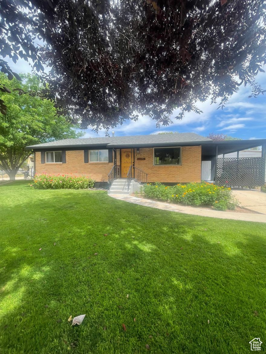 Location, Location, Location.  Close to Schools and Groceries.   Immaculate yard, Fresh paint, new flooring, new shingles, new air conditioner and just waiting for a new owner.  Very well taken care of, lots of pride has went into the home and yard and it shows.  It is a must see!!!!