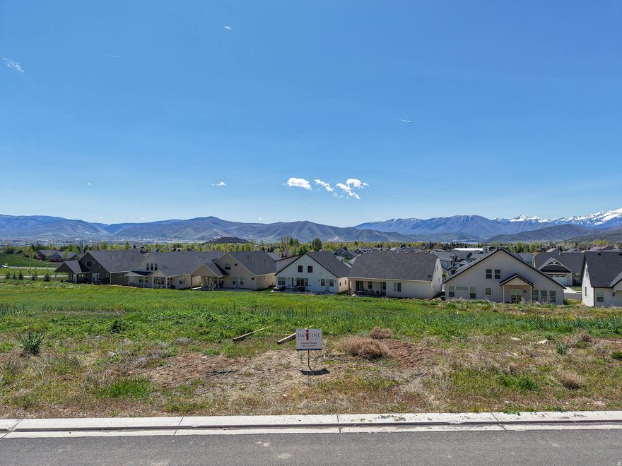 Lot #9.  The breathtaking location boasts panoramic views of historic farms, Snake Creek Canyon, Deer Creek Reservoir and the majestic Mount Timpanogos.  Located in Midway's most exclusive subdivision -- The Reserve.  This exceptional, exclusive location offers the serenity one desires in luxury living.  Amenities include miles of walking trails, sports court, pool, viewing deck and family gathering places.  The Heber Valley has become a mecca for summer and winter recreation.  It's also the gateway to the High Uintas and backdoor to the Wasatch Range.  And it's just minutes to Deer Valley East Village, Sundance and Park City resorts.  Don't miss this extraordinary opportunity to own this stunning, gorgeous lot in The Reserve -- a fully designed and planned community consisting of 48 custom estate homesites surrounded by 30 acres of lush open space. This lot has a gradual slope and is perfect for a walk-out basement.  House plans are included with the purchase of this lot.  The architect is Rich Cliften of Clif10 Design.