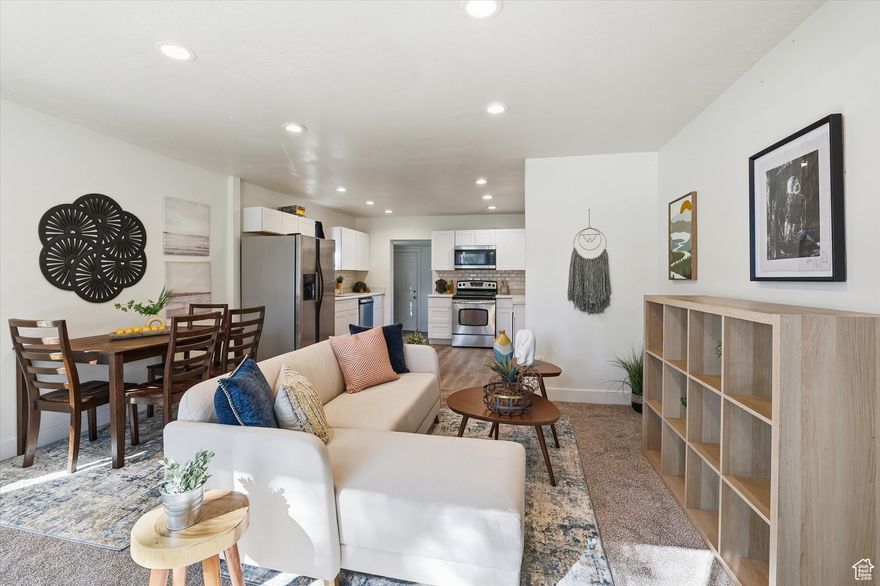 SELLER WILL PAY for 2-1 BUY DOWN. Imagine an Interest rate at 4.5% for the first year and a 5.5% interest rate for year two!!!   BUYER'S AGENT BONUS: $500 IF UNDER CONTRACT BY DECEMBER 31ST.  Beautifully Remodeled Home in the Heart of Ogden!  This move-in ready home has been fully updated with modern finishes and major system upgrades for lasting comfort and peace of mind. The home features 2 bedrooms and 1 full bath on the main level, plus a spacious primary suite with its own private 3/4 bathroom. The complete 2021 remodel included new kitchen cabinets, solid-surface countertops, modern light fixtures, new furnace, HVAC, and water heater, as well as updated electrical with a new exterior panel and updated plumbing throughout. Both bathrooms were remodeled, including a new 3/4 shower and a refreshed main bathroom.  Additional updates include a new roof installed in September 2023 and new living room carpet added in September 2025. The partially finished, non-conforming basement has been used as two additional bedrooms and includes a roughed-in 3/4 bath-ideal for future customization, a dog wash area, or extra storage.  Conveniently located near hiking and biking trails, historic 25th Street, The Junction, and just a short drive to three world-class ski resorts. This home is within the Own in Ogden Grant area, making it a great opportunity for qualified buyers.   Square footage figures are provided as a courtesy estimate only and were obtained from county records.  Buyer is advised to obtain an independent measurement.