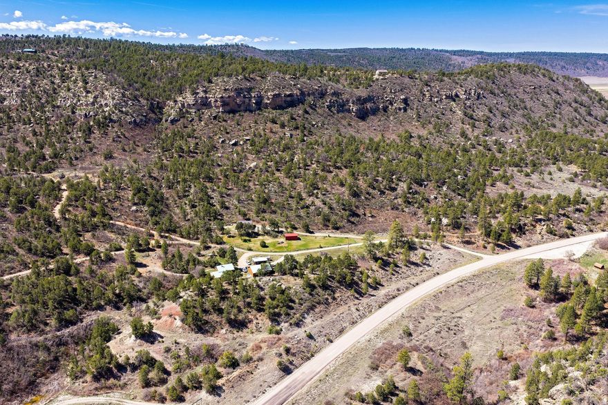 Set against the dramatic backdrop of southeastern Utah's high desert, this 18.15-acre parcel in Old La Sal offers a rare blend of privacy, open space, and breathtaking scenery. From the property, take in sweeping, unobstructed views of the La Sal Mountains and across the horizon into Paradox Valley, Colorado-an ever-changing landscape of rugged beauty and vivid sunsets. With its gently rolling terrain and natural vegetation, this undeveloped residential land provides the perfect canvas for a custom home, getaway retreat, or long-term investment.  Enjoy the peace and quiet of wide-open skies while still being within reach of Moab's recreation and amenities. Whether you're seeking solitude, adventure, or a place to build your vision, this property captures the essence of the American Southwest.  New, improved road for access.