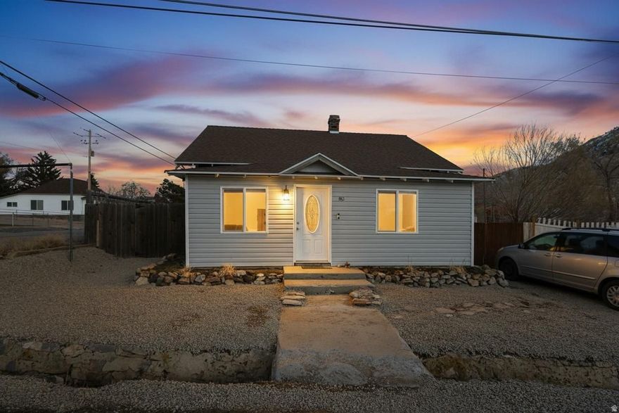 Charming, fully updated home on a prime corner lot in the heart of Eureka! This beautifully refreshed property features new carpet, fresh interior paint, and a fully fenced yard - perfect for pets, play, and privacy. The owners have thoughtfully improved nearly every part of the home, creating a bright, clean, and move-in-ready space. The former sun deck has been professionally enclosed and transformed into a private office, adding valuable square footage and flexibility, while a third bedroom provides extra space for family, guests, or rental potential. The kitchen was updated when the sellers purchased the home and remains functional and inviting, making this a perfect blend of modern updates and cozy charm. Located on a corner lot with great curb appeal and easy access, this home offers both comfort and convenience in one of Utah's most unique historic towns. Whether you're looking for a full-time residence, weekend getaway, or investment opportunity, 80 North Center Street is a rare Eureka find you won't want to miss.
