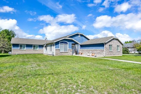 Photo of 3139 N PELICAN DR, Farr West, UT 84404 (MLS # 2134367)