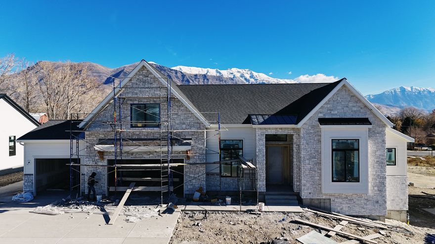 The Roosevelt Floor Plan  Executive Living in American Fork This executive-style floor plan designed to appeal to families of all ages - from young professionals to established households looking for lasting comfort and versatility. This thoughtfully designed home features a basement entrance ready for a future ADU, offering excellent potential for additional living space, guest quarters, or rental income. Located in a prime American Fork neighborhood, this home includes a spacious 10' x 18' deck perfect for outdoor entertaining. Inside, you'll find designer finishes throughout, combining luxury, function, and timeless style. Construction is well underway, with completion anticipated by the end of the year - don't miss your chance to make this stunning new home yours! Ask about the 4.99% fixed rate for qualified Buyers closed by year end.