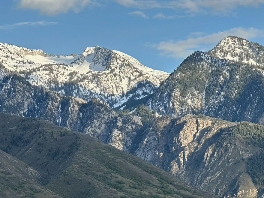 Unmatched views and location!  This unique property, on a bluff and cul-de-sac boasts 1.44 acres, almost unheard of along the Wasatch Front! Drive by and stop for your next sunrise or sunset vista, this lot will exceed all expectations.