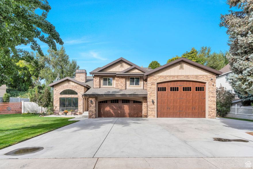 Located in the highly sought after Riverbottoms, this beautifully remodeled home combines luxury, comfort, and functionality in every detail. It features dual master suites, a spacious open concept layout, stunning wood-vaulted ceilings filled with natural light, and multiple gathering spaces perfect for both everyday living and entertaining. Inside, enjoy premium upgrades including in-floor radiant heating with six separate zones, custom blackout smart blinds, newly installed mini-splits for ultra-efficient cooling, plus both gas and wood burning fireplaces. Step outside to professionally landscaped grounds and a private backyard oasis complete with a waterfall and breathtaking mountain views. The garage setup is unmatched with a full pull-through RV garage, additional backyard RV parking, infrared garage heating, and permanent Trimlights for effortless holiday lighting. With quick access to Provo Canyon, Sundance, BYU, UVU, shopping, dining, and recreation, this property is ideal as a primary residence, second home, or Airbnb opportunity. Homes of this caliber don't come around often, schedule your showing today, because this one won't last long! Square footage figures are provided as courtesy estimates only and were obtained from county records. Buyer is advised to obtain an independent measurement.