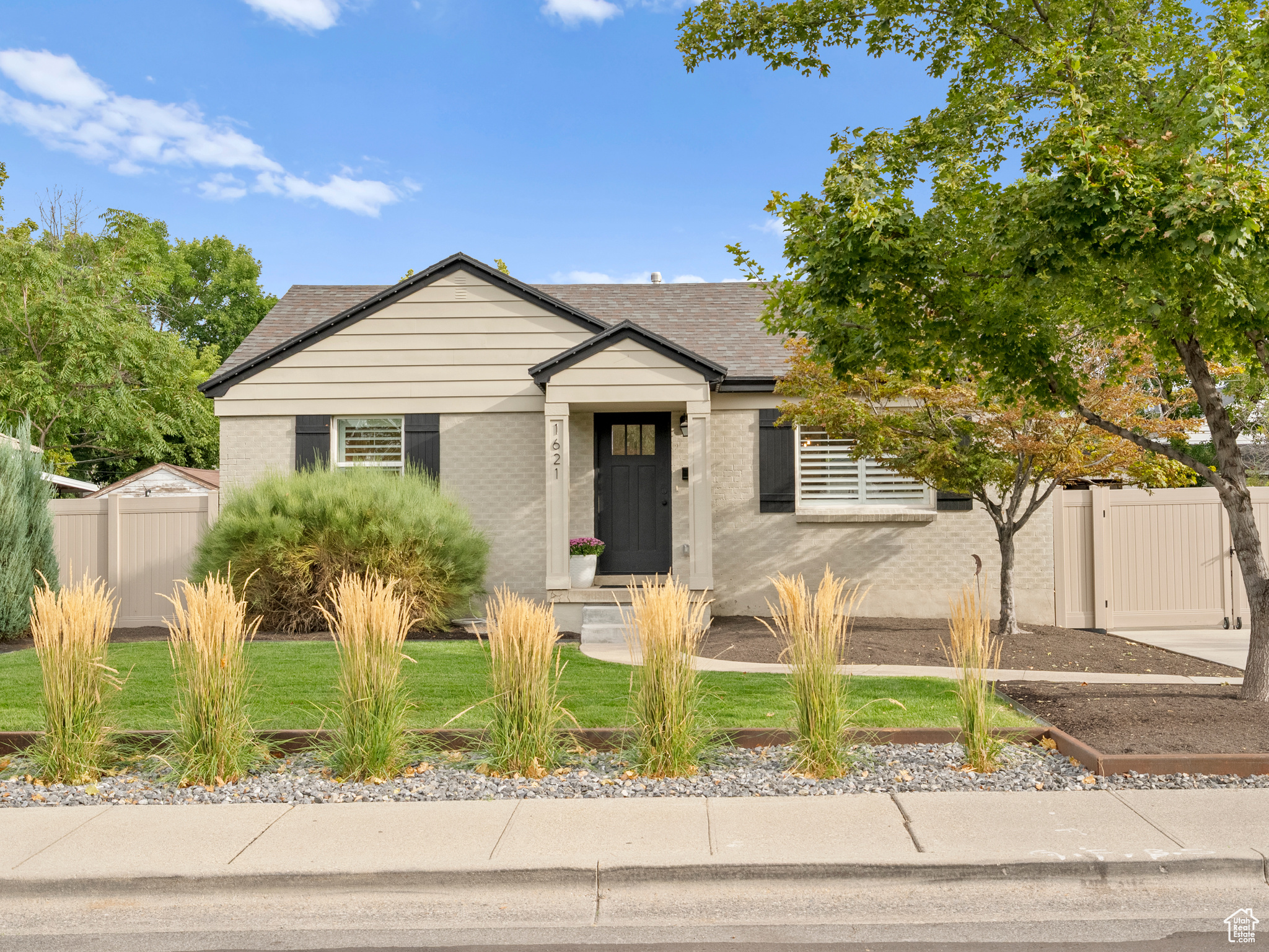 Discover the best of Millcreek living in this beautifully renovated 3 bedroom, 2.5 bath home. Perfectly located with quick freeway access, you'll be minutes from world class skiing and walking distance to local restaurants, shops, and the vibrate MILLCREEK COMMON home of year round activities. Completely remodeled within the last 4 years, this home features updated plumbing, electrical, and high-end finishes throughout. Enjoy a designer kitchen with premium appliances, elegant lighting, upgraded fixtures , and solid wood doors that set this home apart. Plantation shutters and rolling blinds-including blackout options in the basement bedroom and family room add both style and comfort. The outdoor spaces are just as inviting with low-maintenance landscaping supported by a new sprinkler system and a new main water line. A covered back patio creates the perfect setting for entertaining or relaxing, while the spacious two section shed and custom Jellyfish lighting add charm and functionality.