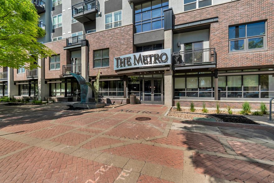 Top-floor living with panoramic skyline views in the sought-after Metro building in downtown Salt Lake City. This bright and open 2-bedroom, 2-bath condo features soaring 10-foot ceilings, abundant natural light, upgraded cabinetry throughout, fresh paint, and new carpet. The updated bathrooms showcase marble finishes and Euro glass for a clean, modern feel. Washer, dryer, and refrigerator are included for added convenience.  Step out onto your private balcony and take in the city lights-perfect for relaxing, entertaining, or enjoying the energy of downtown living. The Metro offers desirable HOA amenities, including a fitness center, skyline terrace, BBQ areas, dog park, and clubroom. This unit also includes two secure garage parking spaces and a storage unit.  Move-in ready and located in the heart of downtown, you'll be just minutes from dining, shopping, entertainment, and the exciting growth of Salt Lake City's evolving entertainment district.