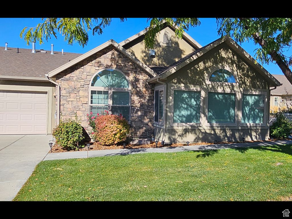 Photo of 327 E 2230 N #A, North Logan, UT 84341 (MLS # 2119460)