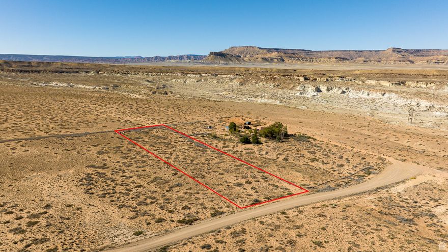 Your Next Adventure Awaits!  This 2.41 acre property borders the breathtaking Grand Staircase-Escalante National Monument and is just minutes from the sparkling waters of Lake Powell. Whether you're dreaming of riding off into the sunset on horseback-yes, it's horse property, or simply looking for your own peaceful retreat- this land offers endless possibilities for recreation and exploration right at your doorstep. With access to utilities, come ready to build your dream home, vacation retreat, or even capitalize on the booming short-term rental market. And with no Codes, Covenants, or Restrictions (CC&Rs), you have the freedom to design and build exactly what you envision with no compromises. Whether you're looking for a savvy investment or a serene escape, this slice of Southern Utah paradise is ready to welcome you home. (Buyer to verify all)