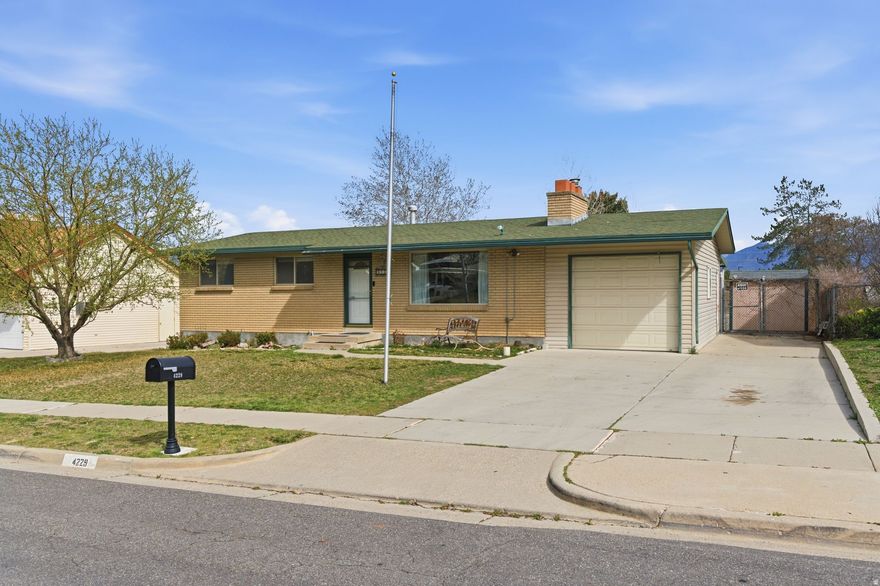 Don't miss this charming home with stunning mountain views! This 4-bedroom, 2-bath property offers 2,214 sq ft and a warm, inviting feel throughout. Features include a bright living room with a cozy fireplace, a functional kitchen with plenty of storage, and easy access to the covered patio and backyard. Nestled in a well-established neighborhood, this home combines timeless character with great potential to personalize.