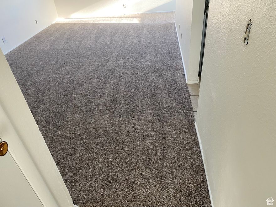 PRICE IMPROVEMENT, Motivated seller. One of the lowest prices in SLC.  Property has new carpet and professionally painted.   Square footage is courtesy estimate only from county records.  Agent/Owner, Seller has never occupied property.  Therefore, is sold, as is, where is. no warranties expressed or implied.  Seller will contribute up to $600.00 toward home warranty of buyer's choice.