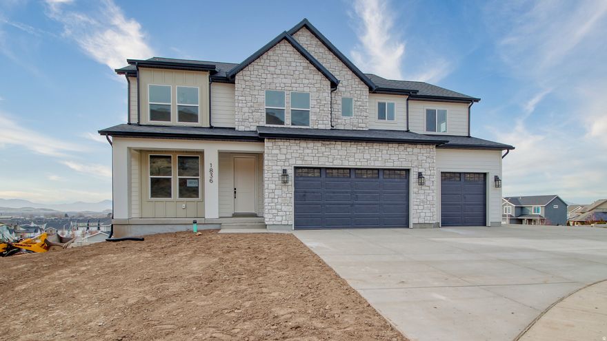 *** OPEN HOUSE SATURDAY JAN 24TH 10AM-12PM*** Welcome to The Tracie-a brand new 4,293 sq ft showstopper sitting at the end of a cul-de-sac with million-dollar, unobstructed views of the valley and the Payson Temple. Yes, those views. The kind that make sunset feel like a nightly event, not an accident. This new build checks every box and then adds a few you didn't know you needed: RV parking, a 3-car garage, and a walk-out basement that's practically begging to become a future ADU, guest suite, or income producer. Inside, the open floor plan actually feels open-thanks to 17-foot ceilings in the great room and walls of natural light. You'll find 4 bedrooms, 3 bathrooms, a statement fireplace, quartz countertops, and a massive walk-in pantry that could survive a Costco run without breaking a sweat. The main floor formal living room is perfect for an office, a flex space, or that "nice room" you pretend you won't use but absolutely will. And the primary suite? It's on another level-huge soaker tub, separate euro shower, double vanities, and a walk-in closet so big it might need its own zip code. Brand new. End of the cul-de-sac. Unreal views. Serious upgrades. And $20,000 toward closing costs when you use our preferred lender and title company. Reach out for details!