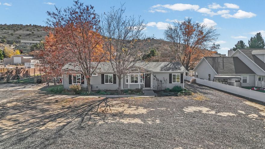 Beautifully updated home on nearly 1 acre in a highly sought-after Diamond Valley. The open floor plan offers modern upgrades, including a new kitchen and extensive updates throughout. The main level features an in-law suite, perfect for multigenerational living or a potential rental. Enjoy RV parking with full hookups, expansive outdoor space, and stunning views of Pine Valley Mountain. With no HOA, this property offers privacy and freedom, plus easy access to all of Southern Utah's outdoor adventures. A rare opportunity to own a spacious, updated home in a prime location "Square footage is a courtesy estimate from the appraisal. Buyer to verify."