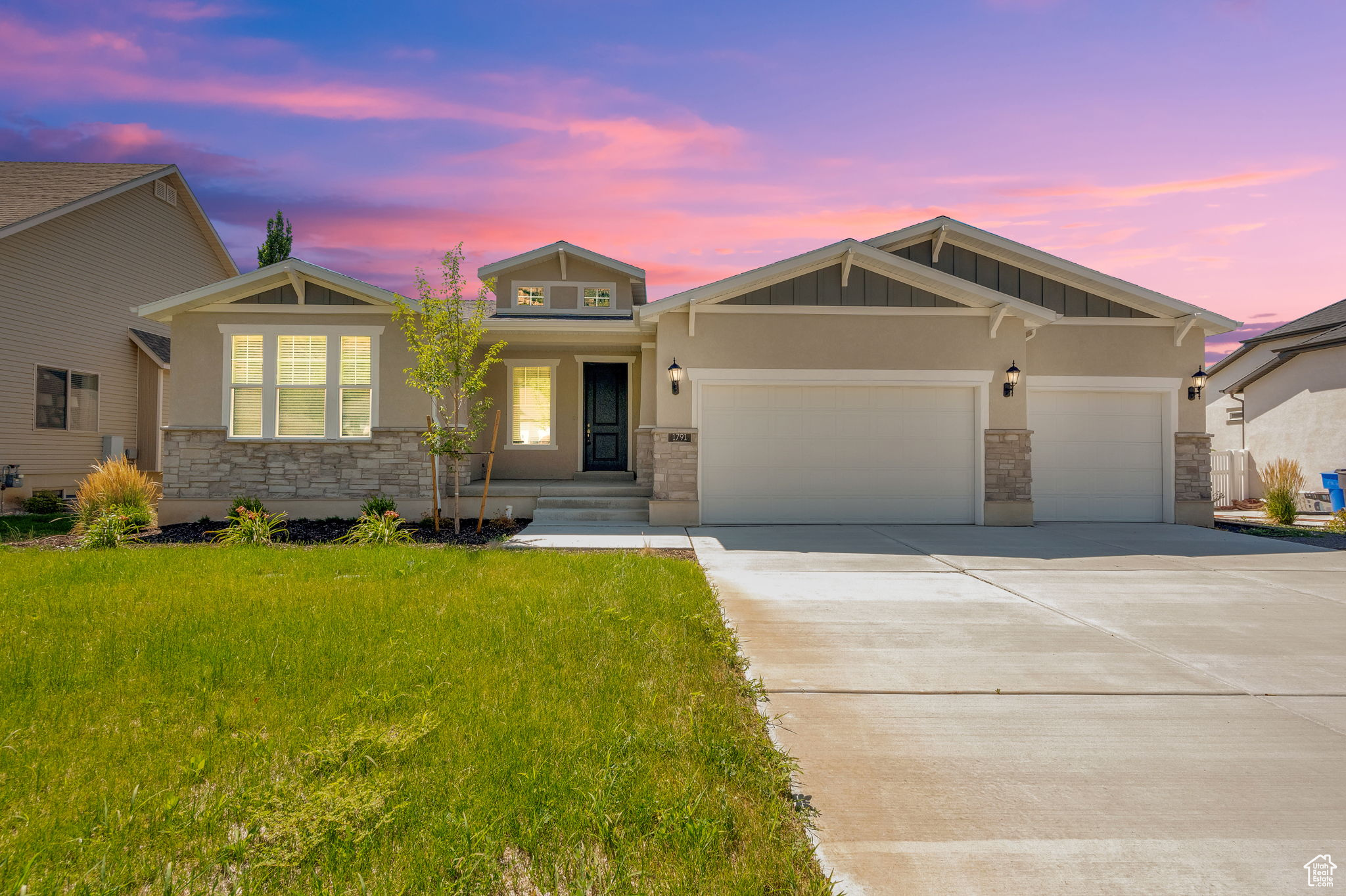 This immaculate, three-year-old Craftsman-style rambler in North Ogden offers stunning mountain views and practical single-level living, with easy access to trails, top-rated schools, and local parks. The home features a 3-car garage and a fully landscaped yard. Inside, the modern kitchen includes birch cabinets, quartz countertops, and stainless steel gas appliances. Elegant finishes include cultured marble shower surrounds, chrome hardware, two-tone paint, and a wood stair railing. The unfinished basement is ready to be finished however best fits your needs. Energy-efficient features throughout. Move-in ready-come see it today!