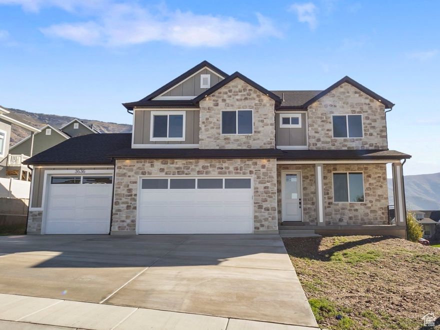 **Incentive-Builder has installed white vinyl fencing in the whole side/backyard.** This Move-in Ready home blends elegant design with functional living. The striking rock and Hardie exterior sets the tone for the thoughtfully designed interior, where a gourmet kitchen boasts soft-close cabinets, high-end stainless steel appliances, granite or quartz surfaces, and a hidden walk-in pantry. The main floor includes a private office, upgraded laminate flooring, and rich two-tone paint. Retreat to the expansive owner's suite with a soaking garden tub, designer shower, and walk-in closet. Outdoor features include a covered 10x14 deck, an oversized 3-car garage with an EV charger and a walk-out basement room for an ADU.