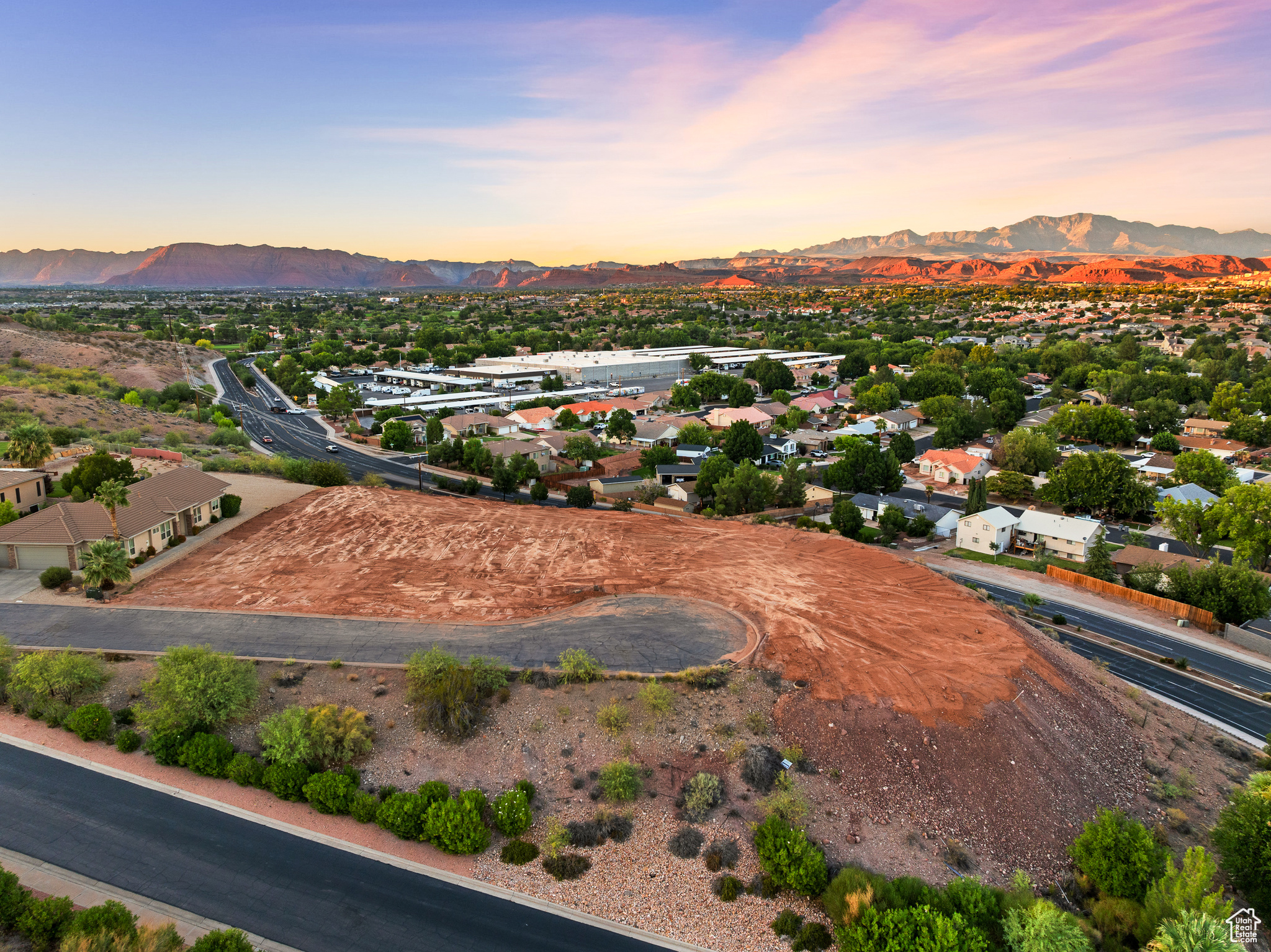 Views are everything here - and Lot 19 has them. This .23-acre parcel in the Crown Point subdivision sits in St. George with unobstructed views of Pine Valley, Snow Canyon, and Red Mountain. Positioned at the end of a cul-de-sac, the lot provides both privacy and a stunning natural backdrop. Pad-ready, with a full soils engineer report, you'll enjoy a head start on the build process. You can design a home that frames those views exactly the way you want. Adjacent lots are available to make almost one acre of buildable land! Inquiry for special pricing for purchasing all three. HOA fee includes water for the home and landscaping.